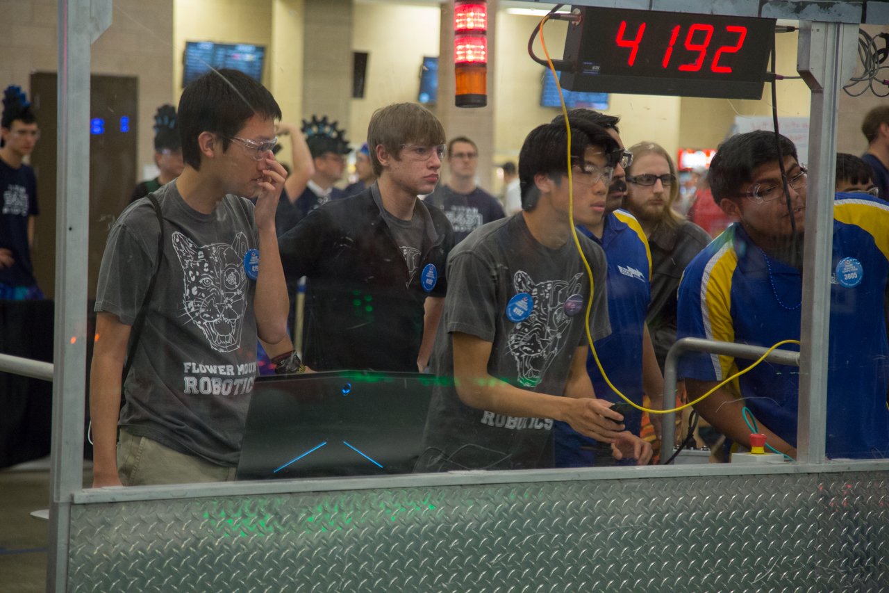 The FIRST Robotics Competition drive team competes at the Dallas Regionals.